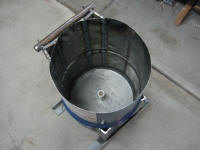 Angle iron frame around 30 gal drum